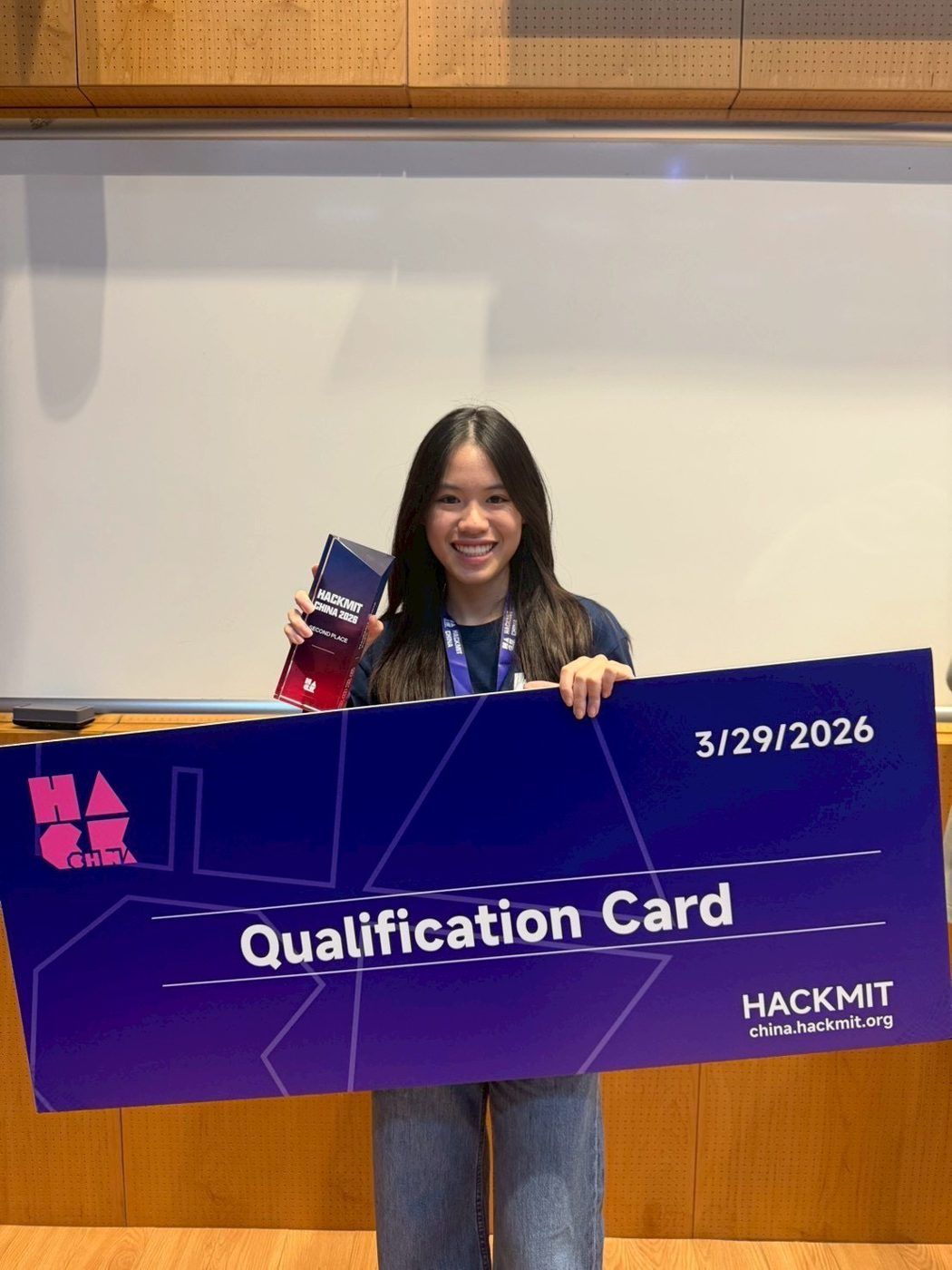 Holding the Hack MIT China qualification card