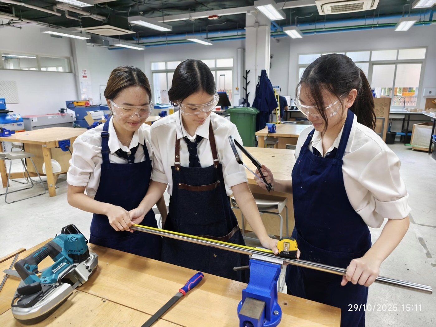 Measuring the steel tower in the design workshop