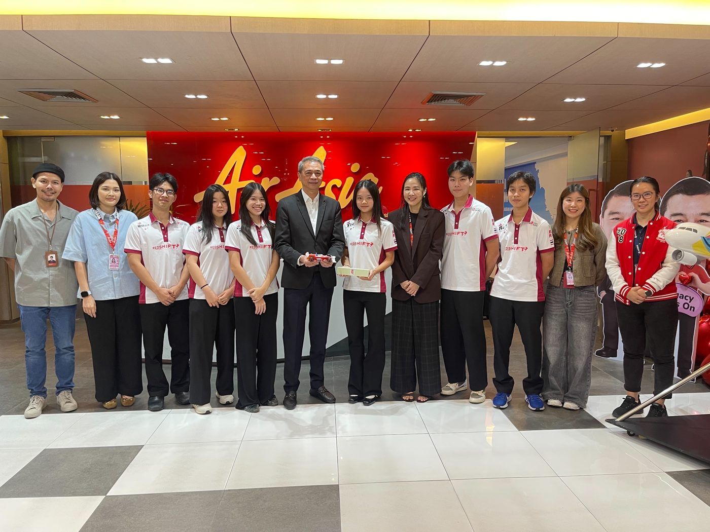 Team with sponsors at a partner event